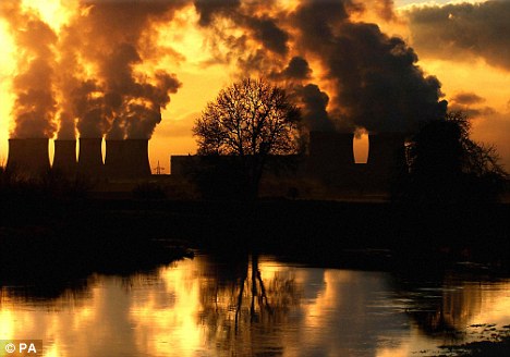 Emissions rising from Drax Power Station near Selby, Yorkshire - the climate change act will cost the UK £18billion a year. If greenhouse gas emissions are halved by 2050, temperature increases could be limited to 2C and catastrophic climate change avoided.