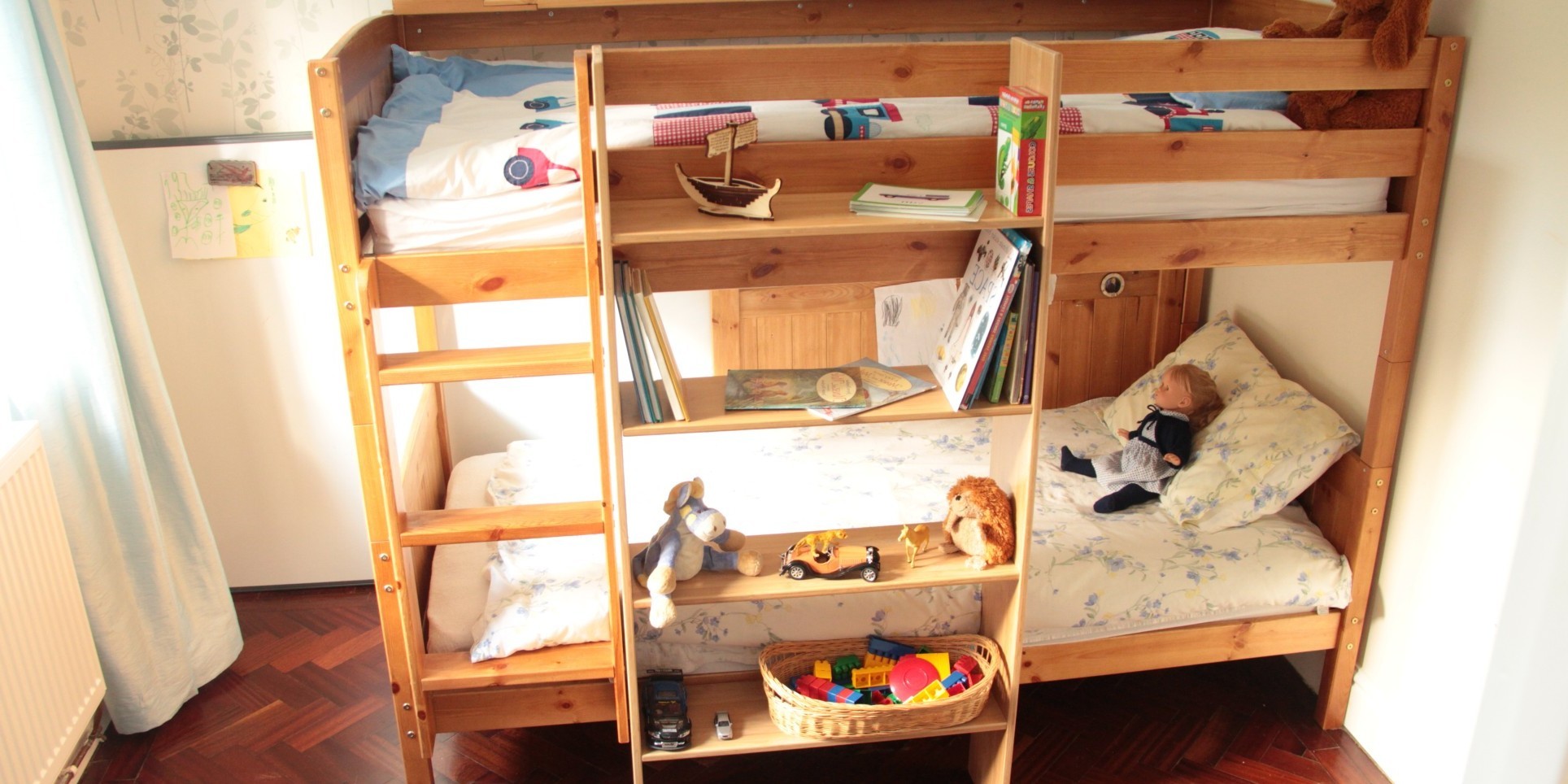 wooden bunk beds with shelves